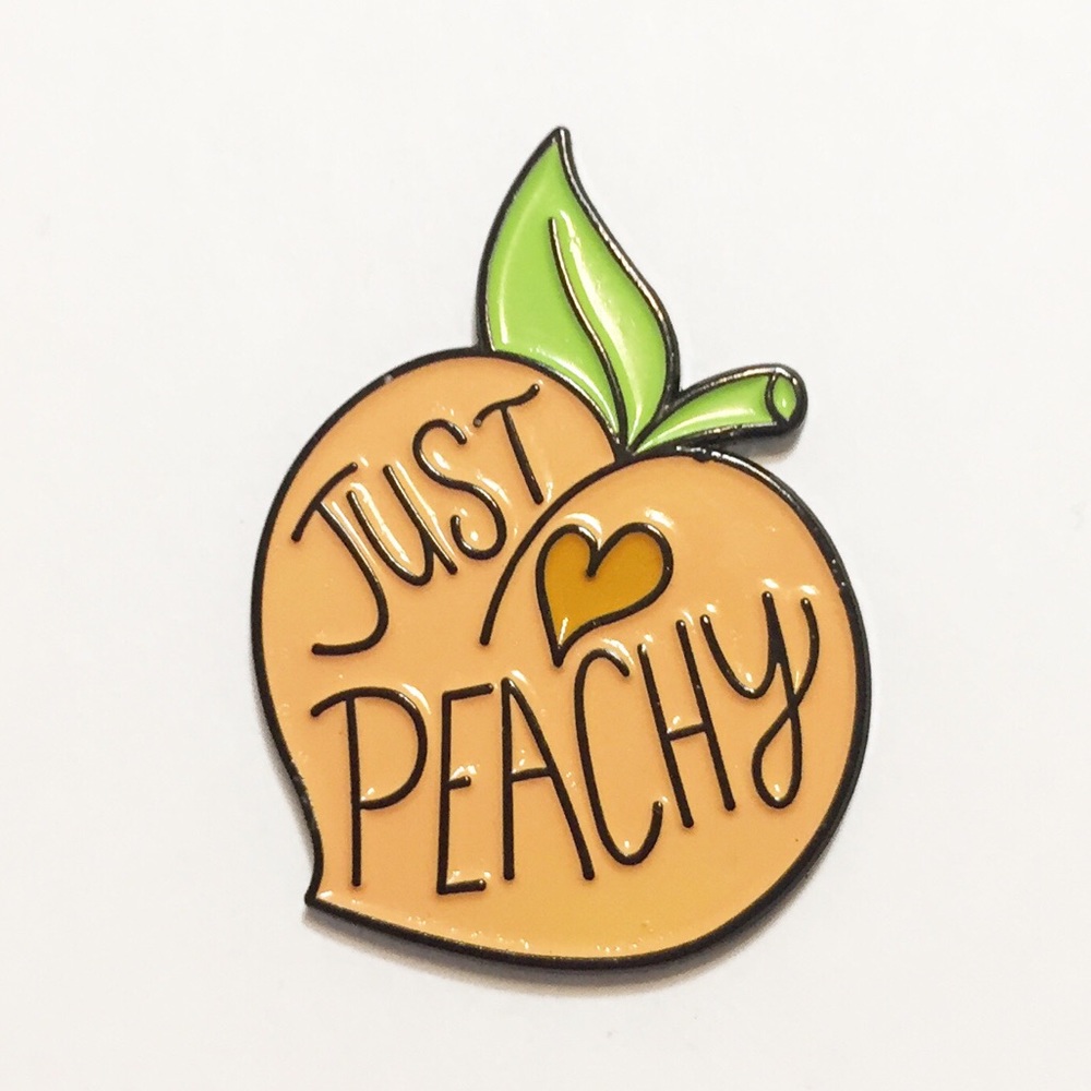 Peach heart enamel pin